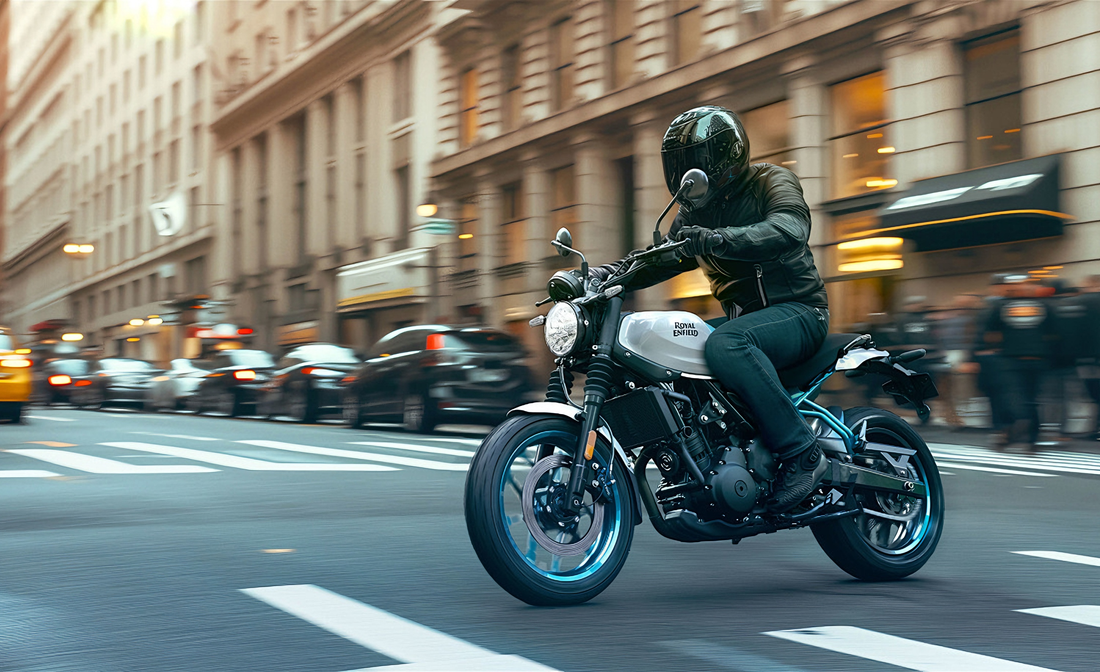 Motorcycle rider commuting through busy city streets blog cover